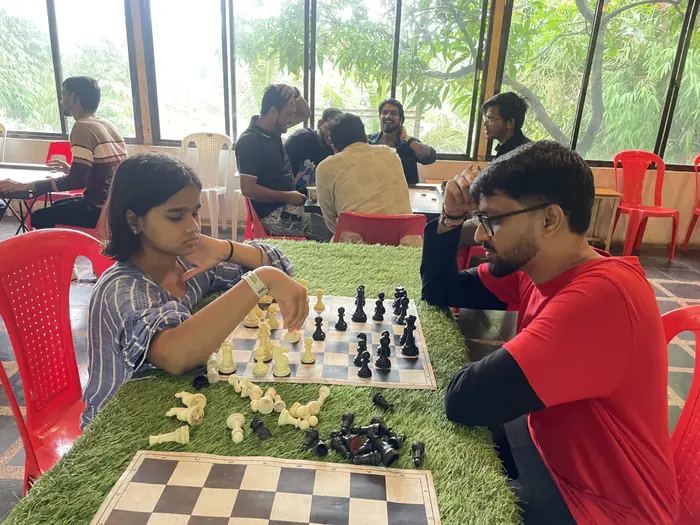 Barquecon Technologies colleagues playing chess during a break